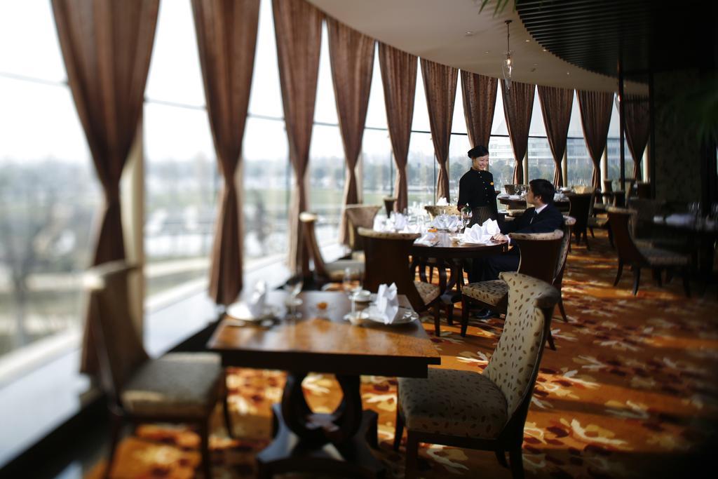 New Century Grand Hotel Нинбо Экстерьер фото